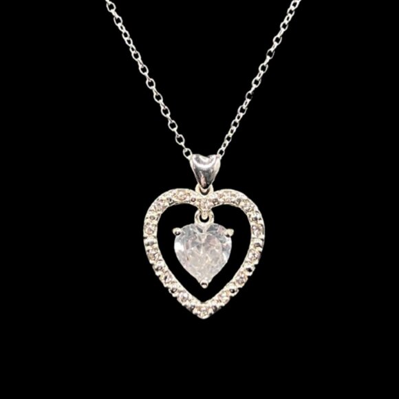 Avon Jewelry - Vintage Avon Silver Triple Heart Pendant on Silver-Toned Chain